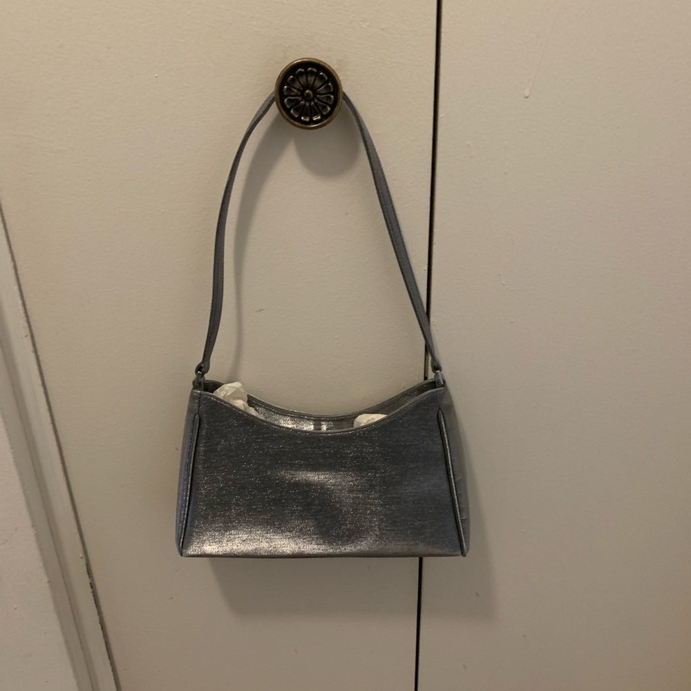 Cutie tootie mini gray silver purse.